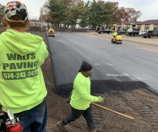 laying an asphalt parking lot